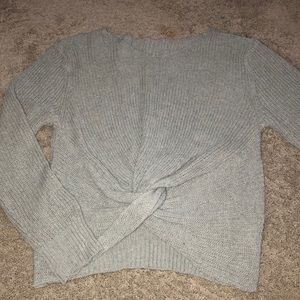 Grey sweater with knot in front